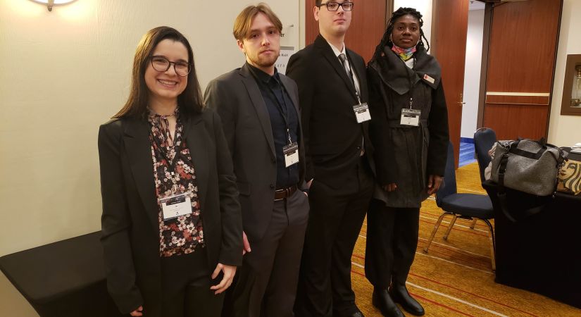 Four OC students at the Model NATO conference.