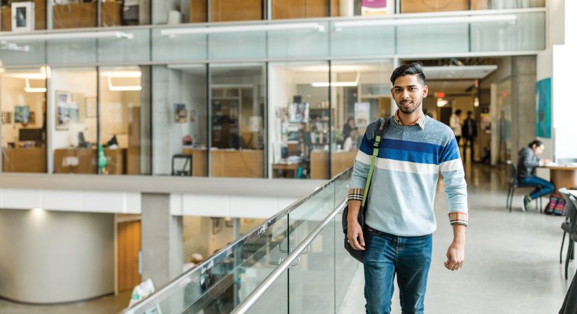 A student walking at Okanagan College