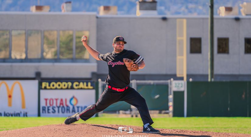 man throwing baseball
