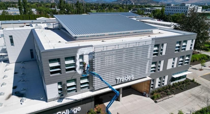 Power washing side of OC Building at Kelowna campus