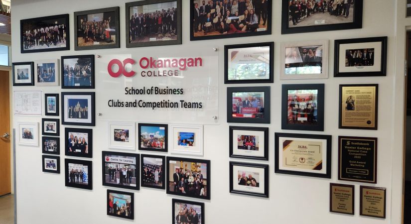 OC School of Business Clubs and Competition Teams Wall located on the second floor of the Kelowna campus Centre of Learning