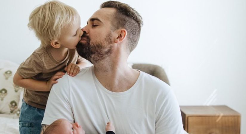 Image of Kelly Loudoun with his two young sons.