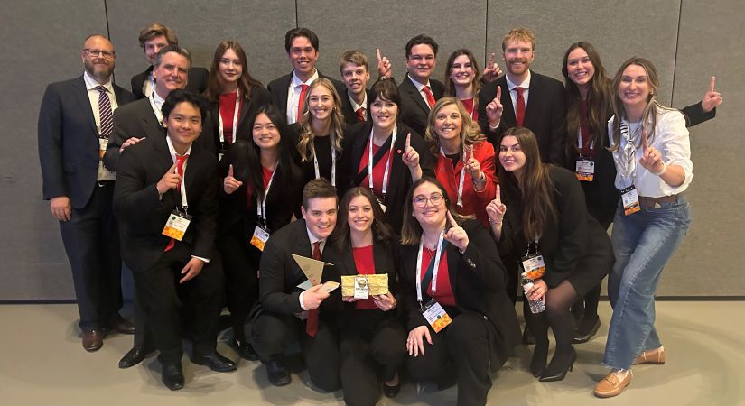 Enactus group photo. Students smiling together