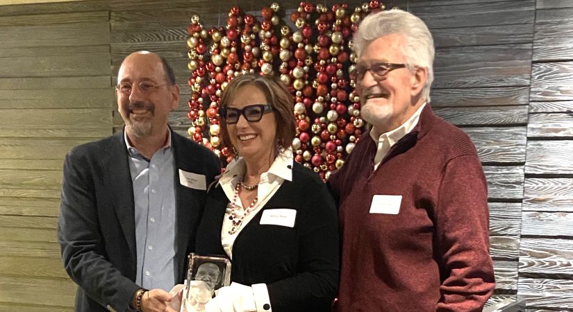 Dr. Melissa Munn (middle) after accepting the Ed McIsaac Human Rights in Corrections Award. Ed McIsaac in on the right and Dr. Ivan Zinger, correctional investigator in on the left