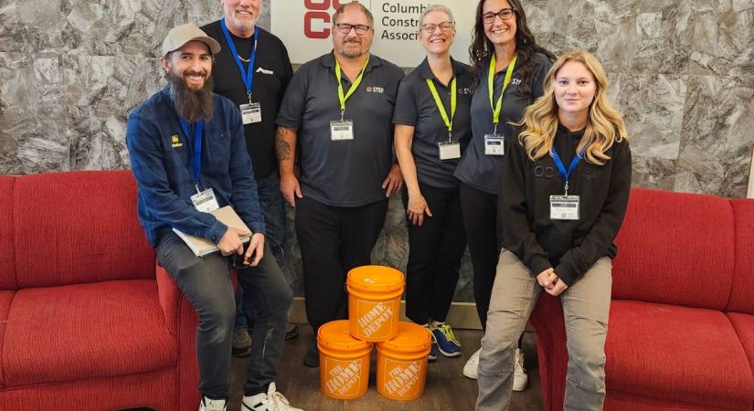 Graham Booth (far left) and Miranda Allen (far right) with Greyback Construction